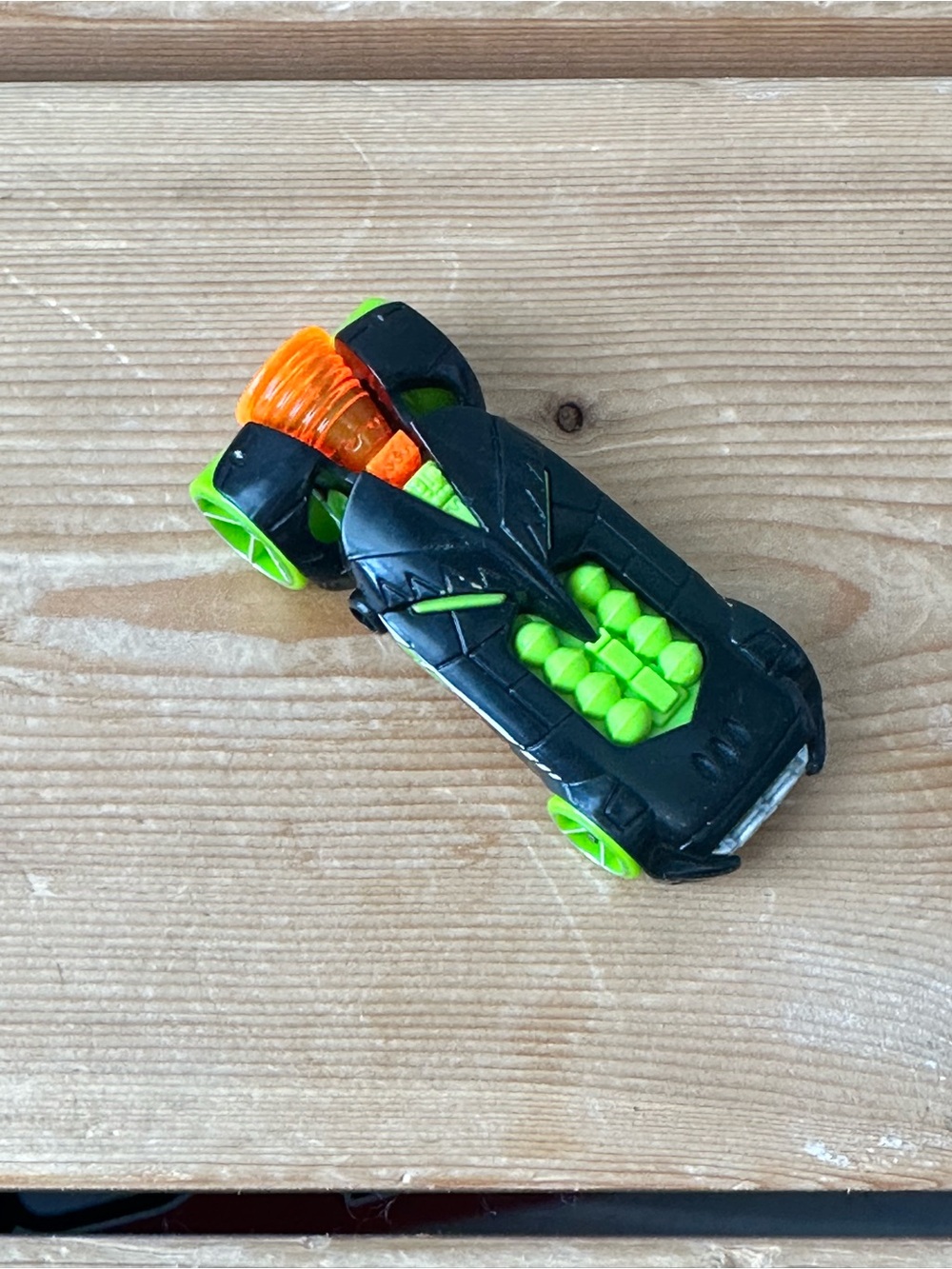 Hot Wheels RocketFire die-cast toy car from 2013 featuring a black body